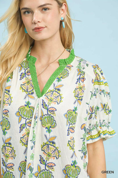 Green Umgee V-neck top with abstract border print, casual women's blouse from Trendsi.