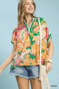 Green Umgee abstract print oversized top with relaxed fit and long sleeves, featuring a stylish, artistic design.