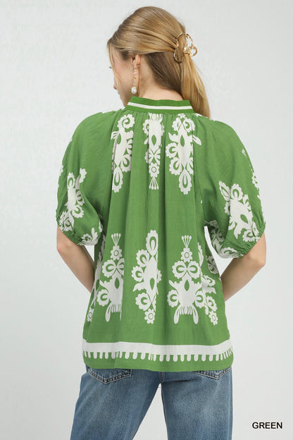 Green Umgee boho print split-neck short sleeve top with relaxed fit and casual style, perfect for bohemian-inspired outfits.