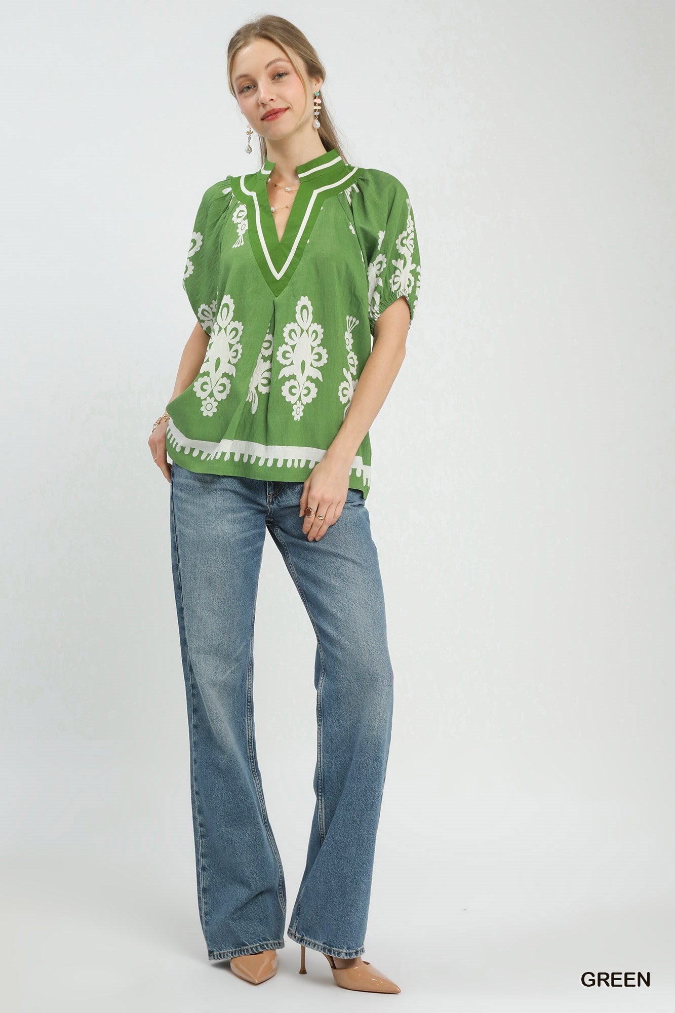 Green Umgee boho print split-neck short sleeve top with relaxed fit, perfect for casual and bohemian-inspired outfits.