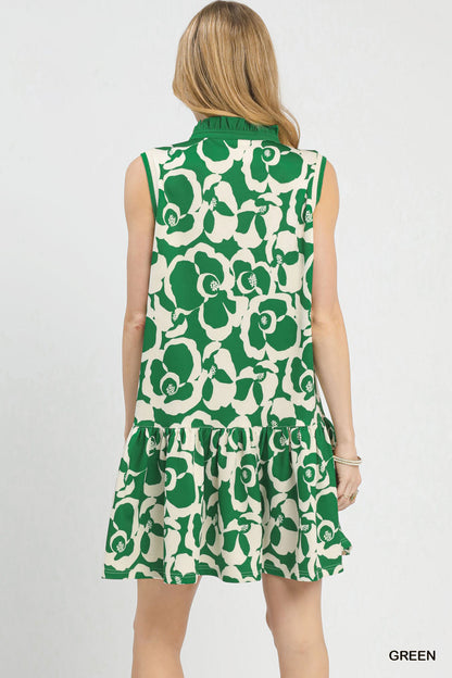 Green Umgee floral sleeveless tiered dress with a relaxed fit, featuring a tiered skirt and floral pattern.