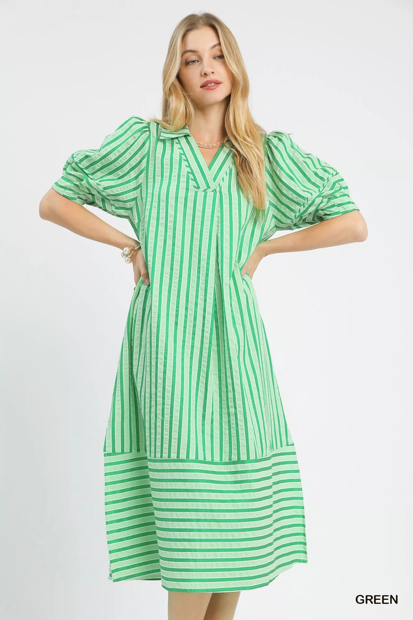 Green Umgee striped puff sleeve midi dress with a fitted waist and flowy skirt, perfect for casual or semi-formal occasions.