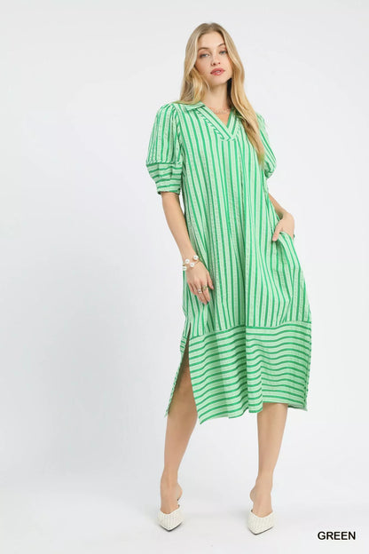 Green Umgee striped puff sleeve midi dress with a fitted waist and flowing skirt, styled for casual or semi-formal occasions.