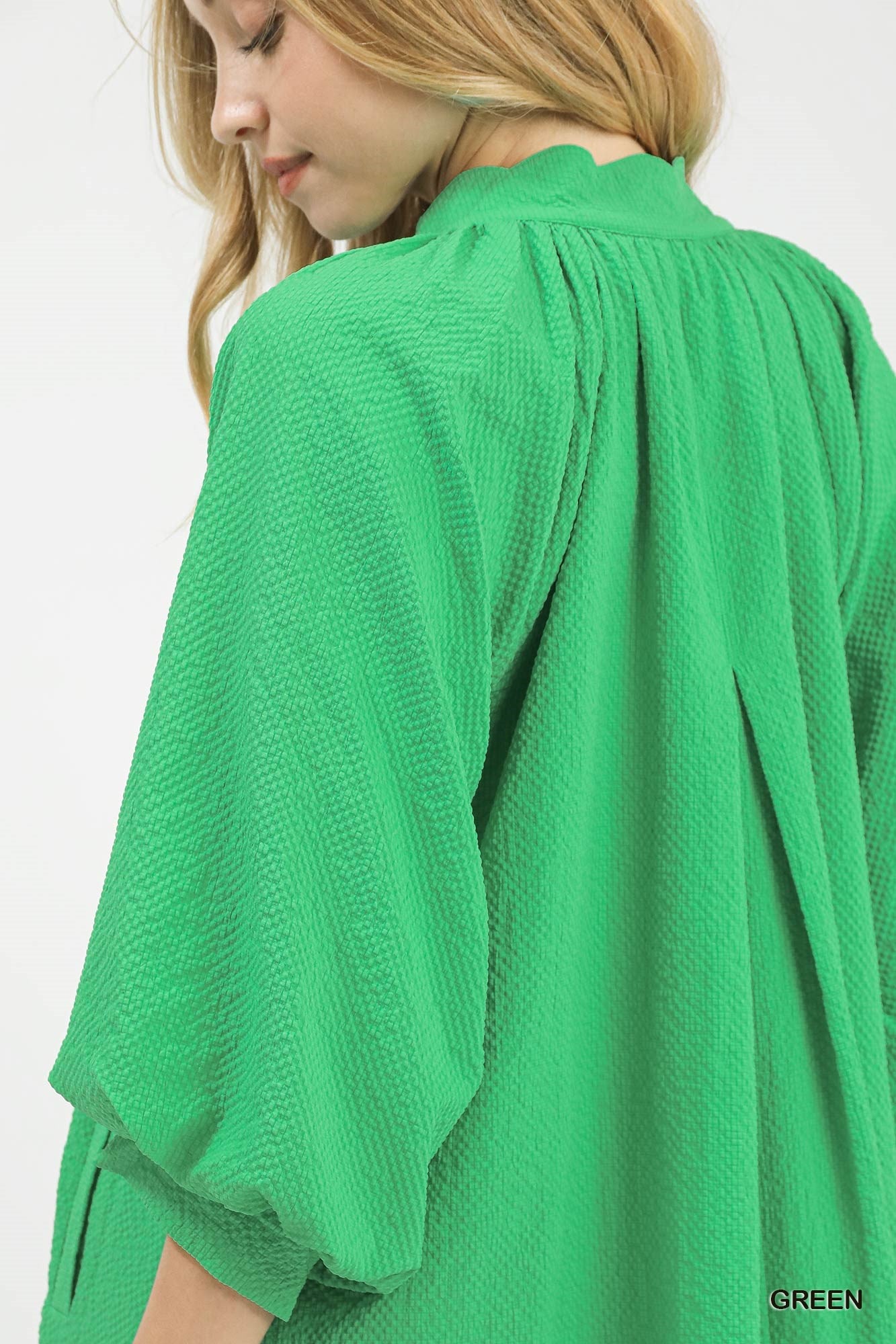 Green Umgee textured pocket mini dress with short sleeves and a relaxed fit, perfect for casual or daytime wear.