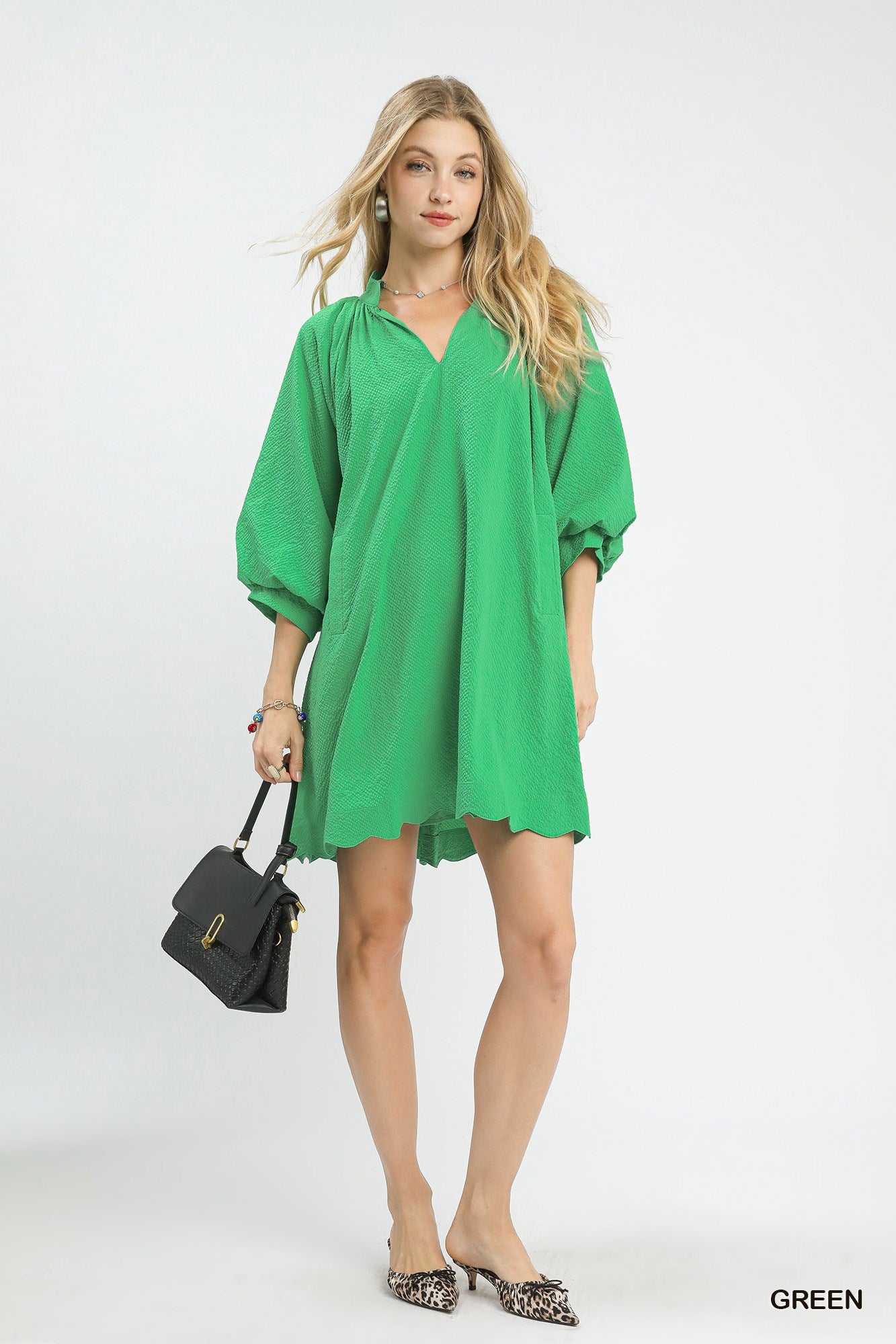 Green Umgee Textured Pocket Mini Dress with short sleeves and side pockets, perfect for casual and summer wear.