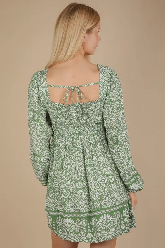 Green printed boho mini dress with smocked chest and short sleeves, trendy and casual for summer and outdoor wear.