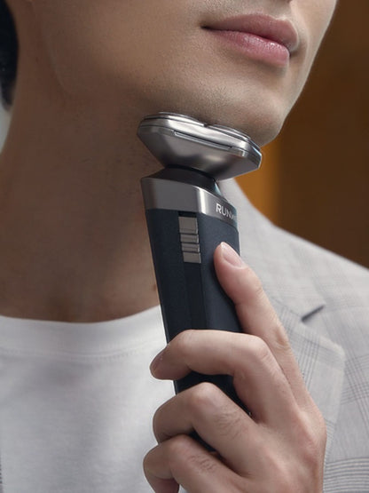 Grey rechargeable rotary shaver from Trendsi with a sleek design and a one-size-fits-all handle for smooth, close grooming.