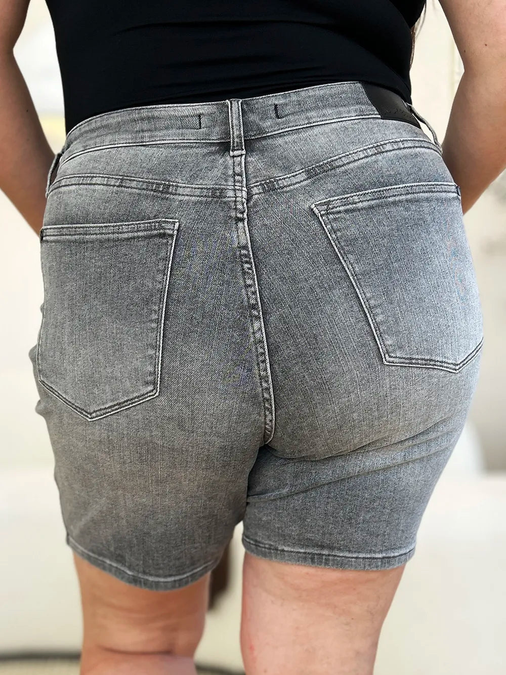 Grey Judy Blue full-size high waist washed denim shorts with distressed details and classic five-pocket design.