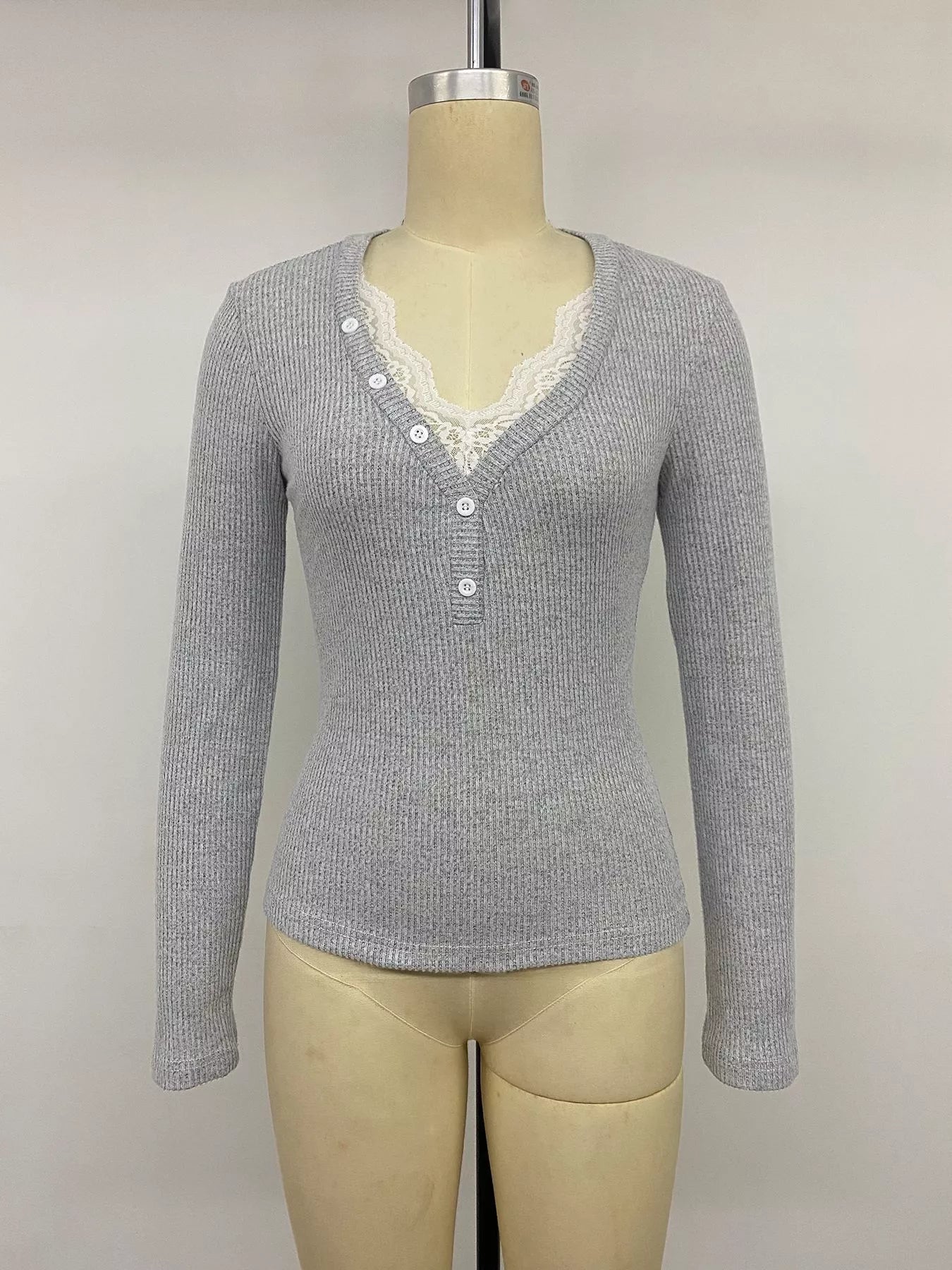 Grey ribbed lace trim Henley T-shirt from Trendsi, featuring a buttoned neckline and casual fit with lace accents.