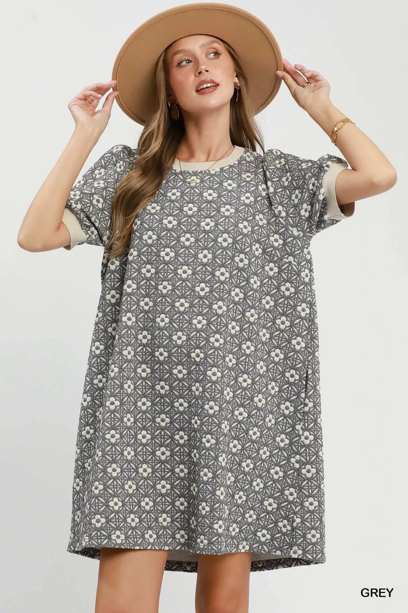 Grey Umgee floral textured mini dress with puff sleeves, featuring a stylish and feminine design perfect for casual or semi-formal occasions.