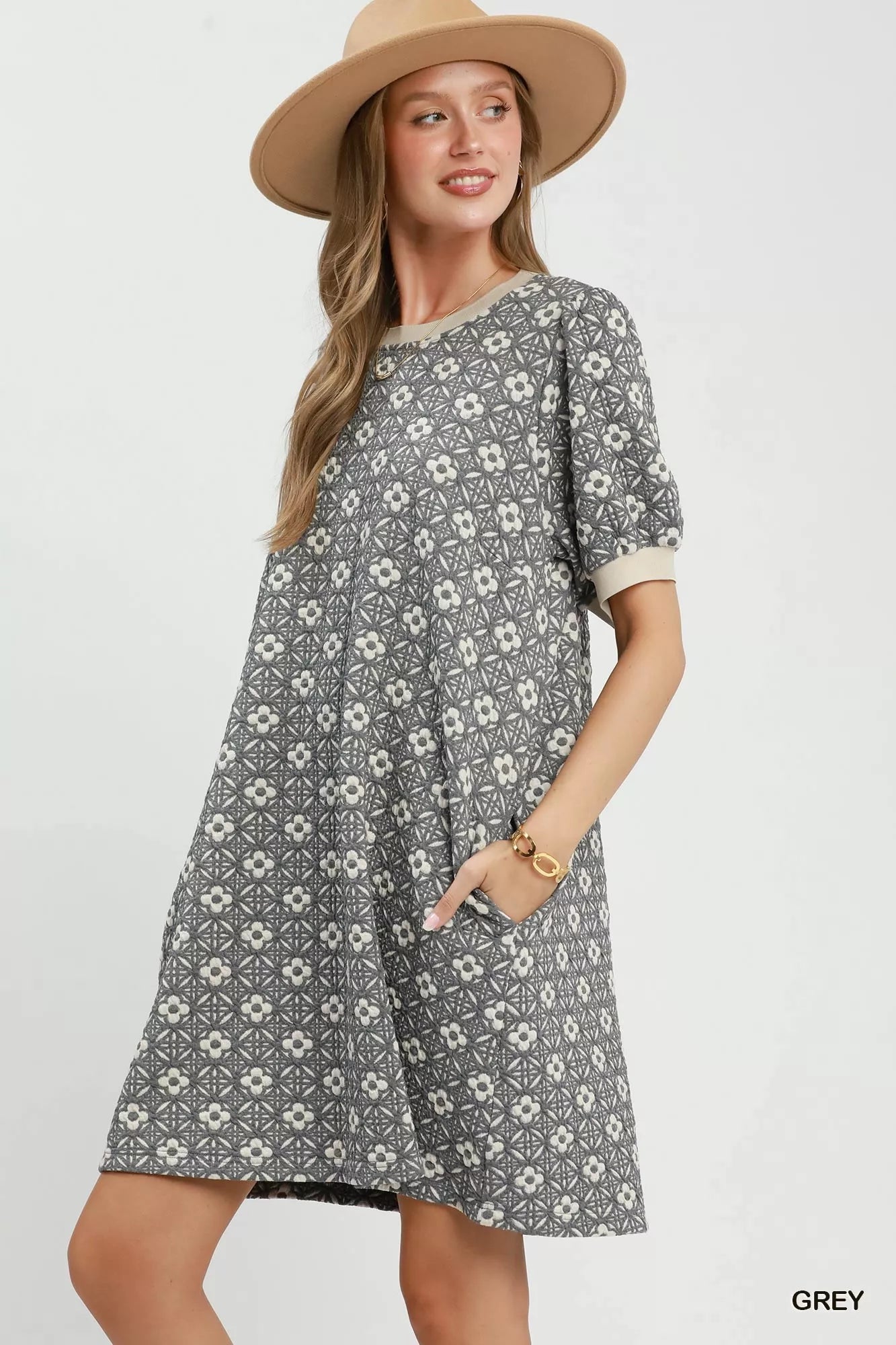 Grey Umgee floral textured puff sleeve mini dress with a fitted bodice and stylish short puff sleeves.