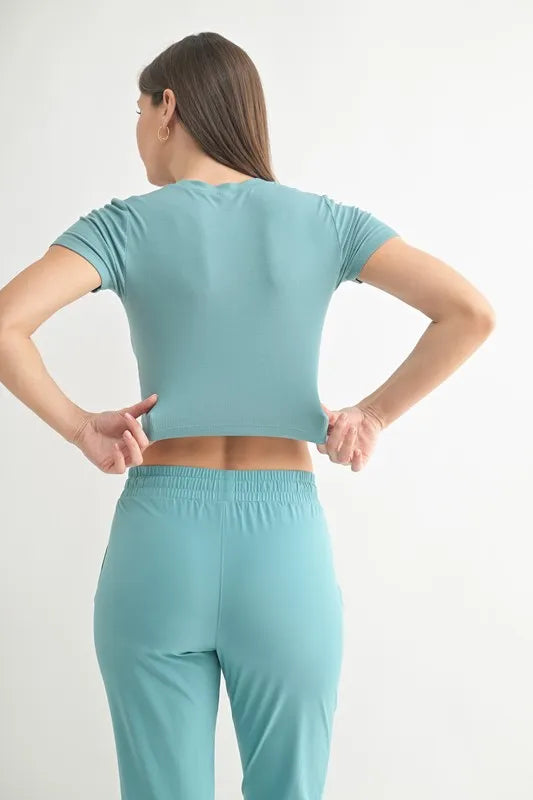 Grey and teal MONO B Essential micro-ribbed cropped athleisure tee with short sleeves, fitted style, and ribbed texture.