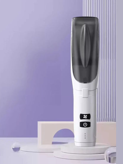 Trendsi low noise hair clipper with sleek design, featuring a white and silver body and adjustable blades for precise haircutting.