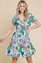 Trendsi BOMBOM floral ruched V-neck short sleeve dress with a gum leaf pattern, perfect for casual or summer wear.