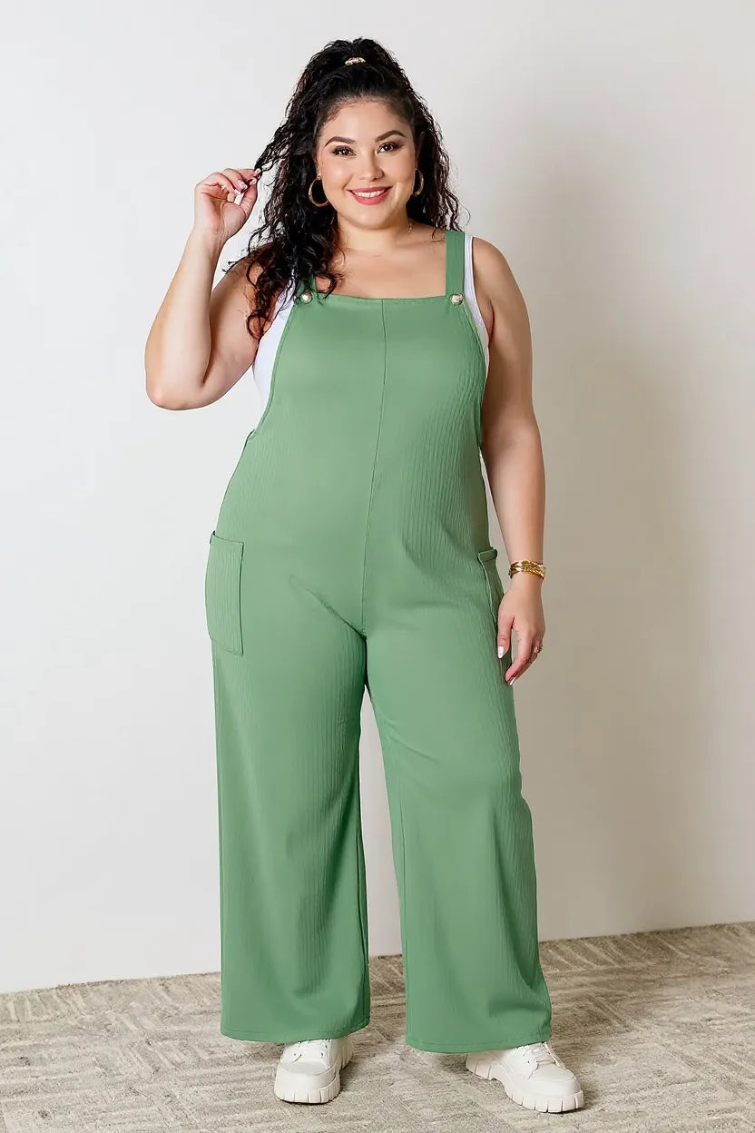 Trendsi Double Take full-size wide strap overall with pockets, featuring a relaxed fit and stylish gum leaf pattern fabric.