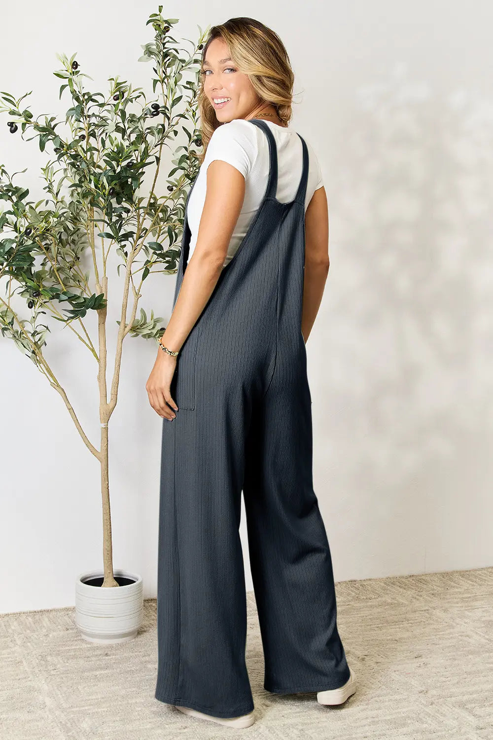 Trendsi Double Take full-size wide strap overall with pockets, in a gum leaf print, casual and stylish for everyday wear.