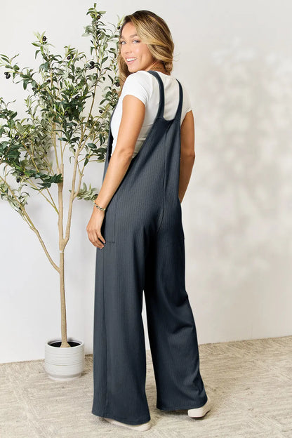 Trendsi Double Take full-size wide strap overall with pockets, in a gum leaf print, casual and stylish for everyday wear.