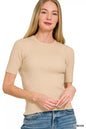 Beige Zenana Viscose Ribbed Round Neck Sweater, by Trendsi, featuring a close-up view of the ribbed knit and round neckline.