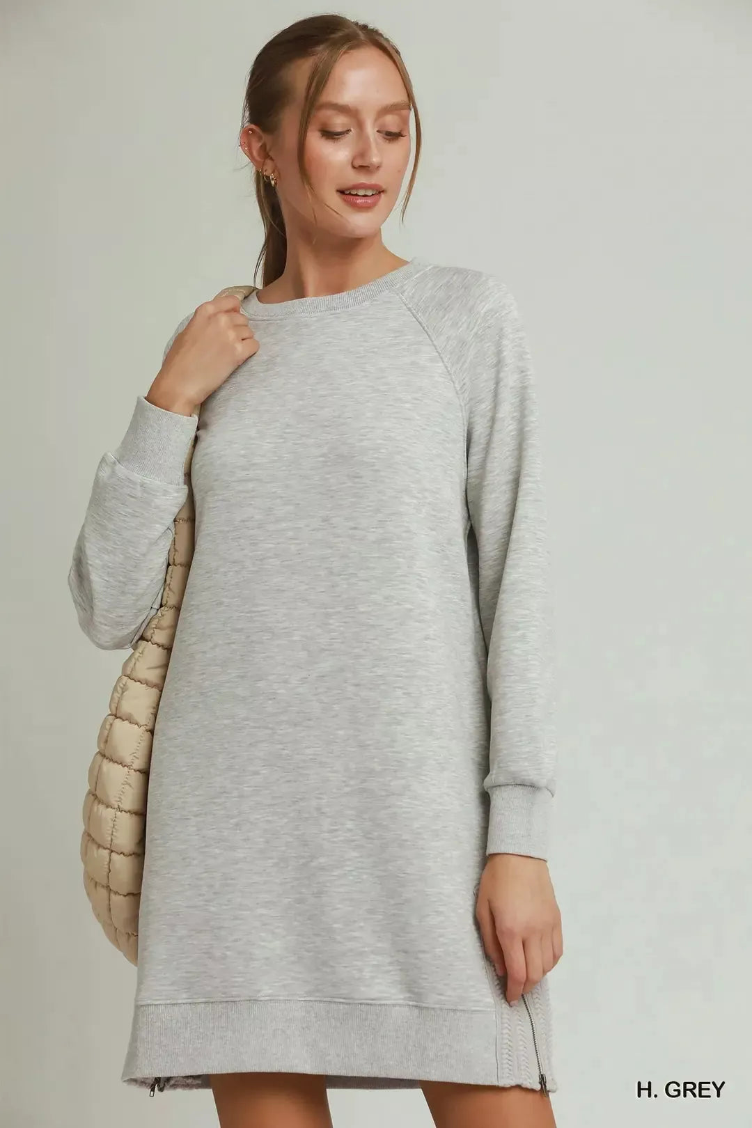 Grey Umgee dress with side crochet detailing and zipper accents, showcasing a stylish and casual women's dress design.