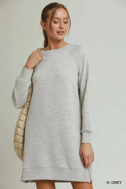 Grey Umgee dress with side crochet detailing and zipper accents, showcasing a stylish and casual women's dress design.