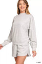 Grey Zenana Scuba long sleeve sweatshirt and shorts set from Trendsi, featuring a comfortable, casual matching activewear ensemble.