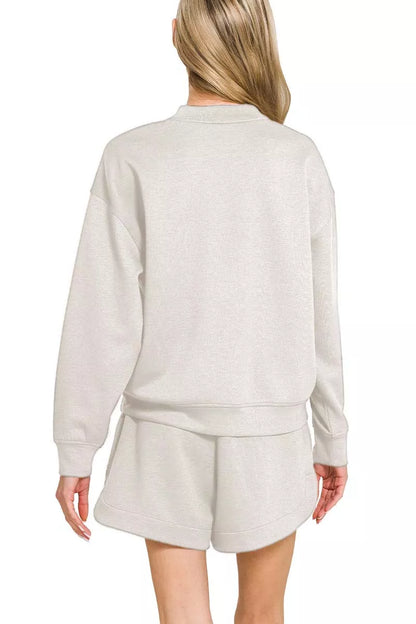 Grey Zenana scuba long sleeve sweatshirt and shorts set from Trendsi, casual loungewear with a comfortable fit.