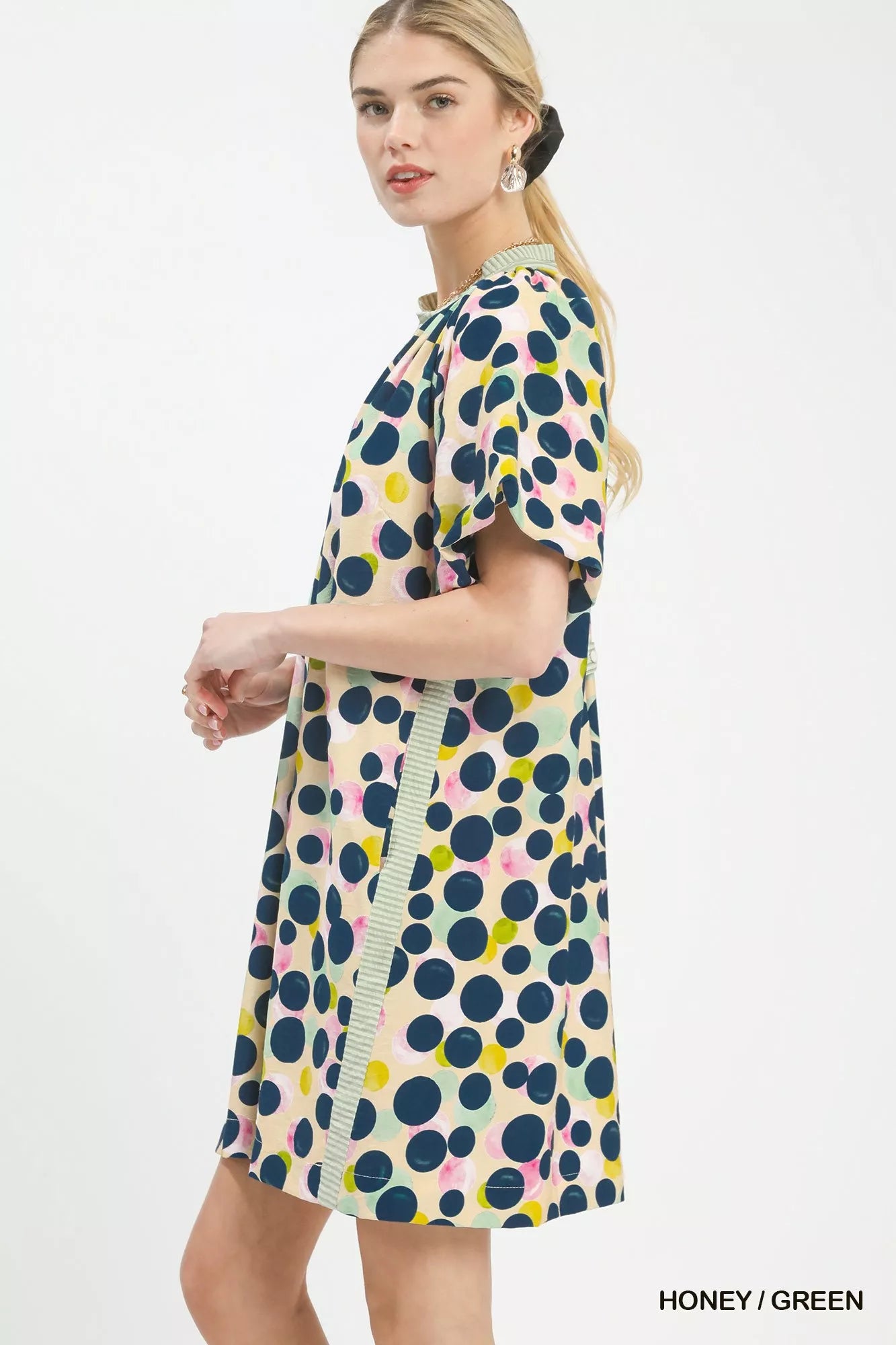 Honey green polka dot print tunic dress by Umgee featuring long sleeves and a relaxed fit, perfect for casual wear.