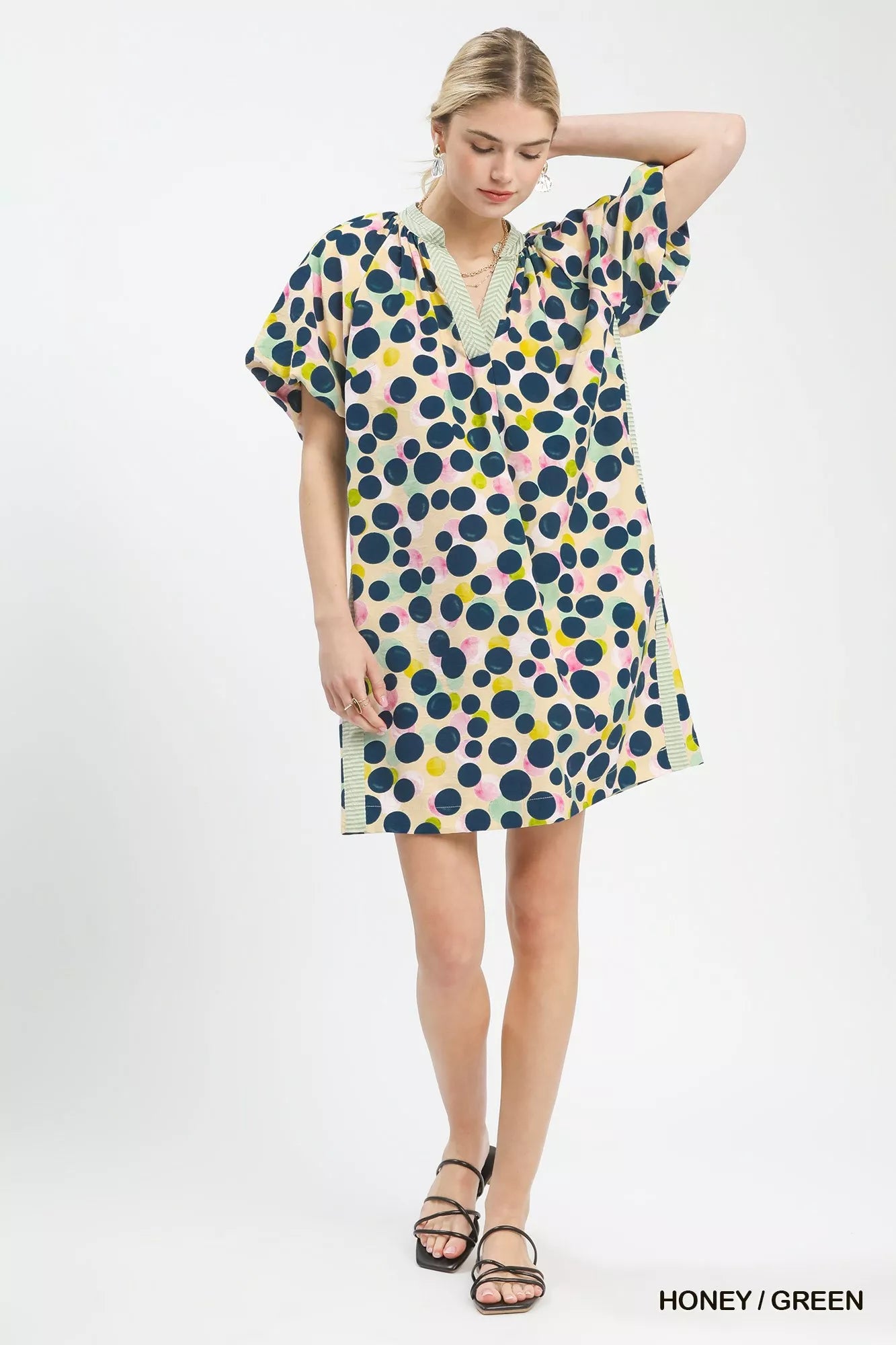 Honey green Umgee polka dot print tunic dress with long sleeves and relaxed fit, perfect for casual wear.