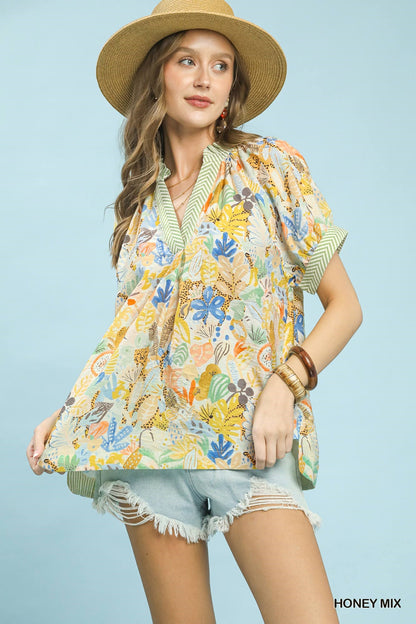 Umgee Mix Boho printed V-neck top featuring a relaxed fit and bohemian style, perfect for casual and everyday wear.