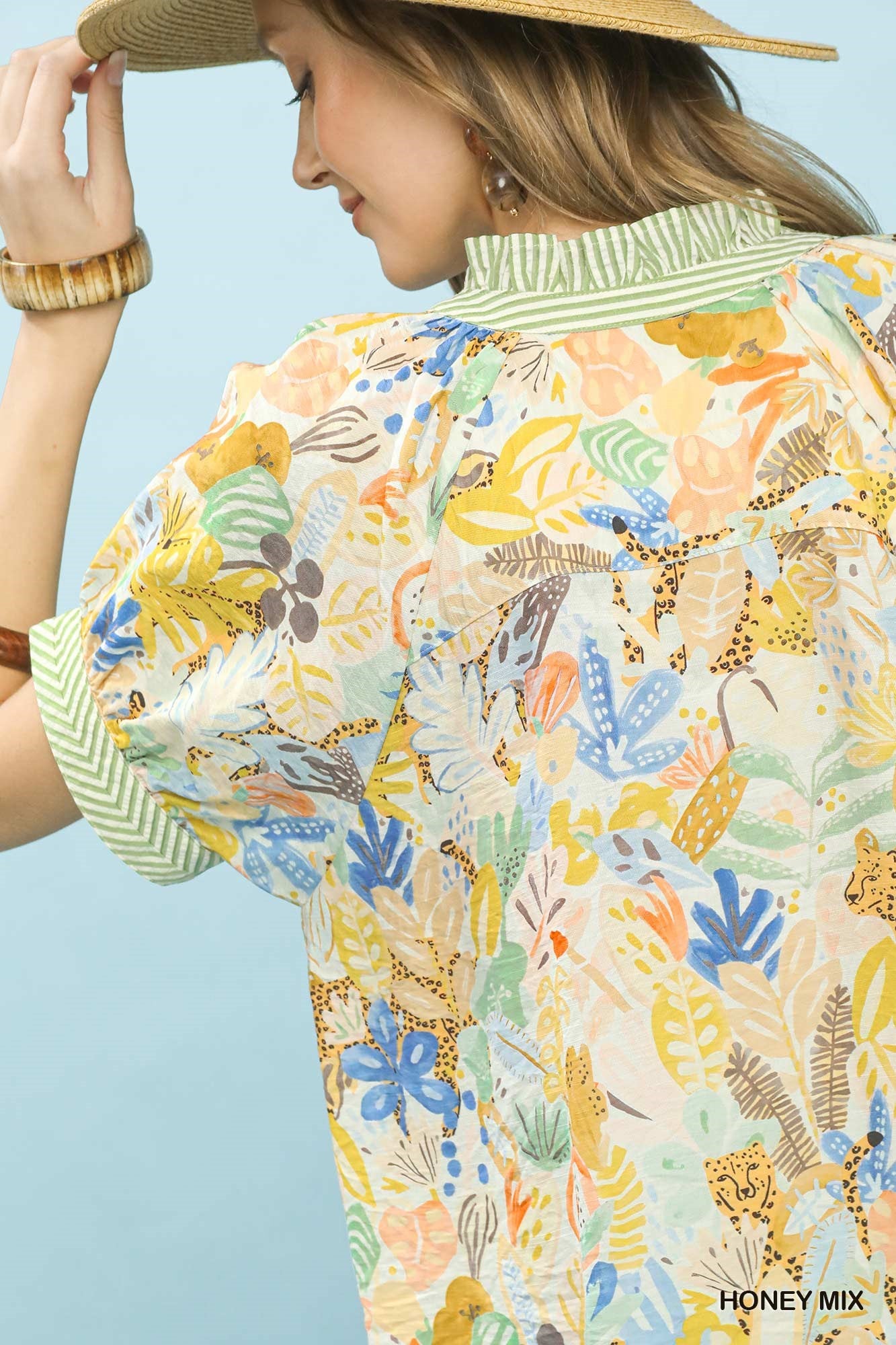 Umgee mix boho printed V-neck top in honey color, featuring a relaxed fit and stylish bohemian design.