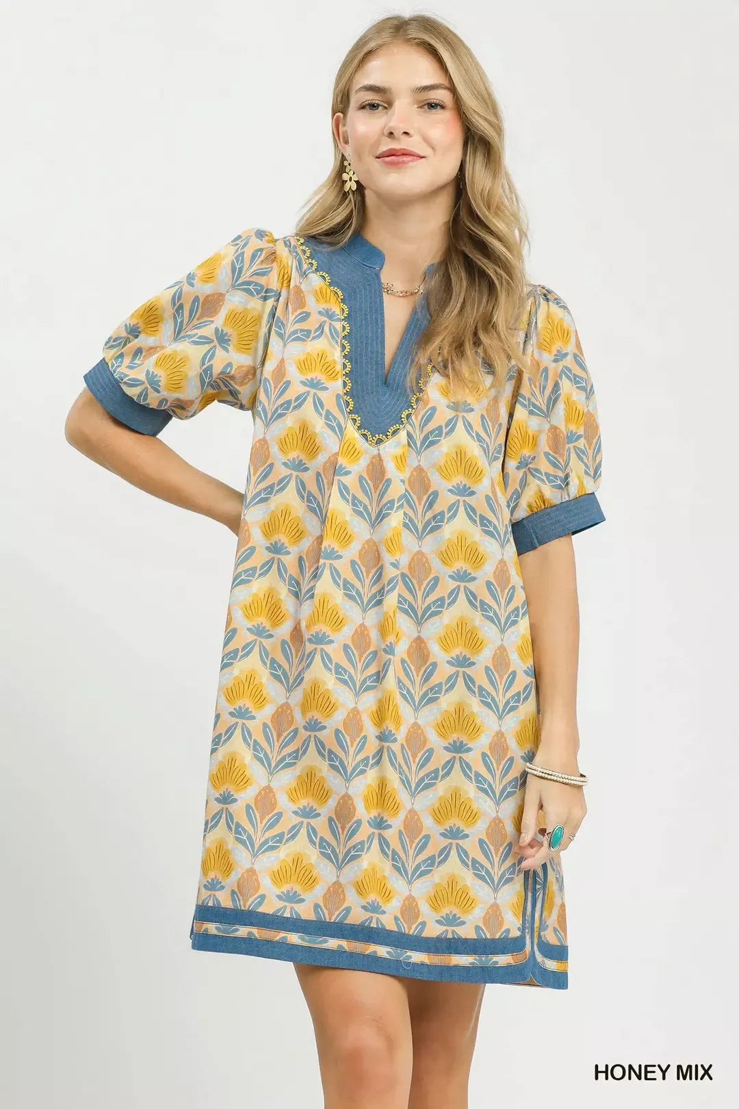 Trendsi Umgee Mix Tile Print Mini Dress featuring a stylish pattern, short sleeves, and a flattering fit in a vibrant tile design.