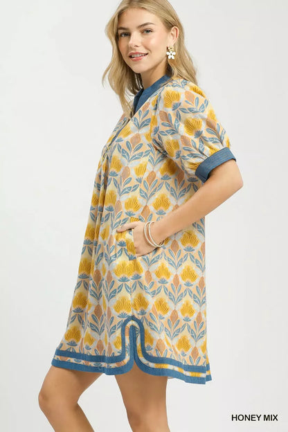 Honey-colored Umgee Mix Tile Print Mini Dress by Trendsi, featuring a stylish pattern and lightweight fabric.