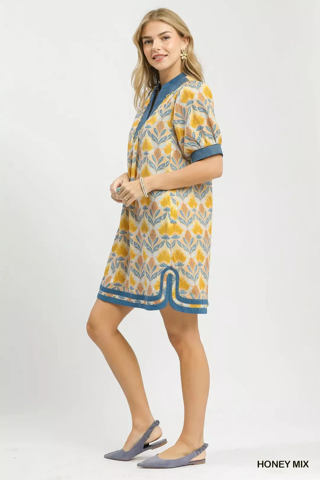 Honey-colored Umgee Mix Tile Print Mini Dress by Trendsi featuring short sleeves and a fitted silhouette.