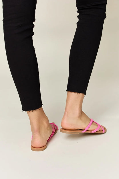 Hot pink Wild Diva crisscross PU leather open toe sandals with ankle straps and block heels.