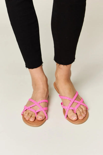 Hot pink WILD DIVA crisscross PU leather open toe sandals by Trendsi, featuring stylish strap design and open toe style.