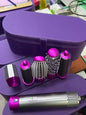 Hot pink Trendsi interchangeable curling iron wand set with European plug and multiple barrel sizes for versatile styling.