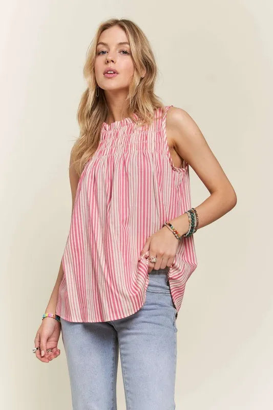 Hot pink ADORA sleeveless top with contrast stripes, frill details, and a round neck from Trendsi.
