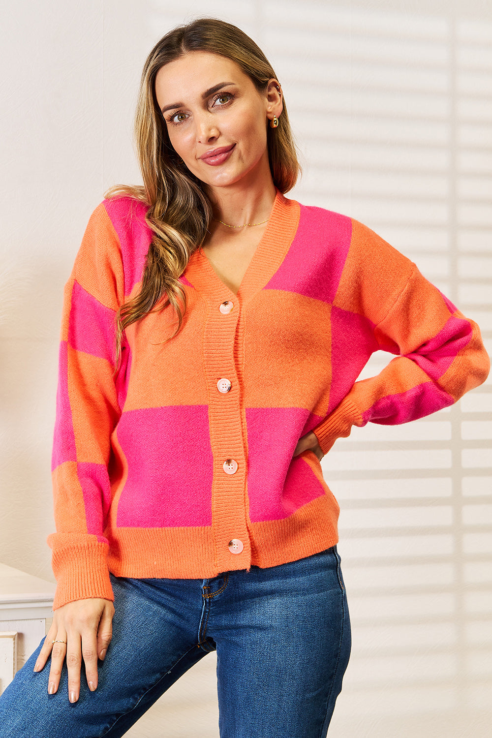 Hot pink angel wings woven cardigan with checkered pattern, V-neck, and dropped shoulders by Trendsi.