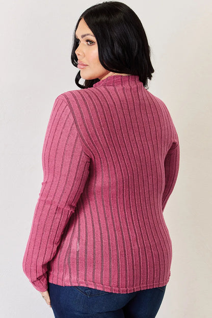 Hot pink Basic Bae ribbed mock neck long sleeve T-shirt by Trendsi, showcasing the fitted ribbed fabric and stylish mock neckline.