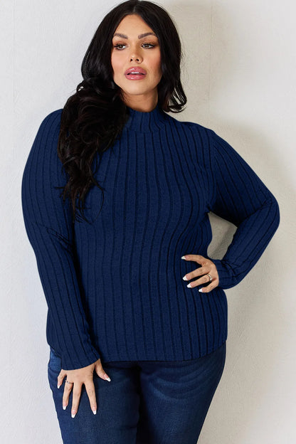 Hot pink Trendsi Basic Bae full-size ribbed mock neck long sleeve T-shirt, showing the fitted ribbed fabric and mock neckline.