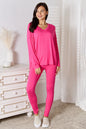 Trendsi pink lounge set with V-neck long sleeve top and matching soft rayon pants, comfortable loungewear for relaxed wear.