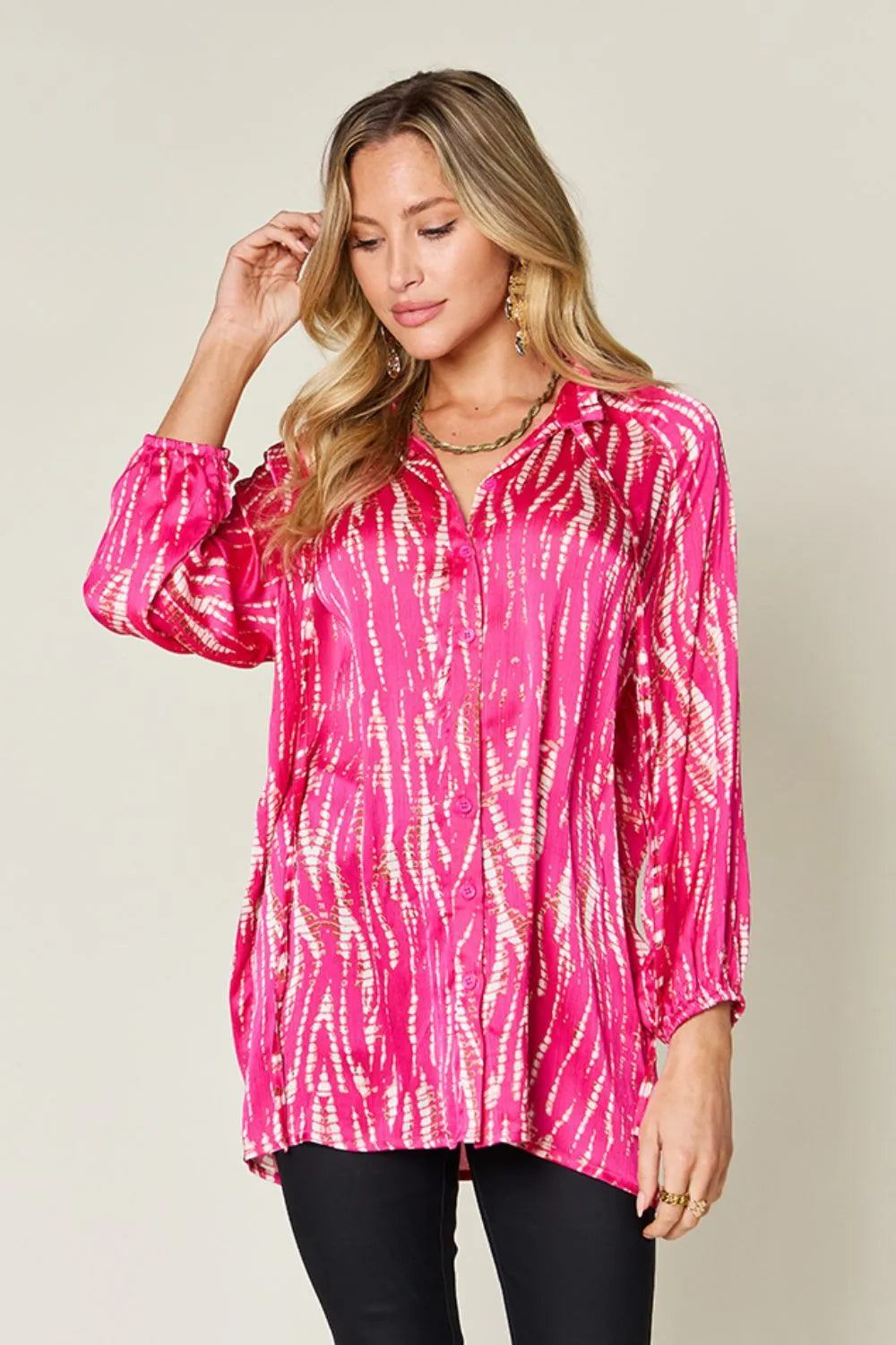 Hot pink Trendsi Double Take full-size printed button-up long sleeve shirt, featuring vibrant pattern and classic collar design.