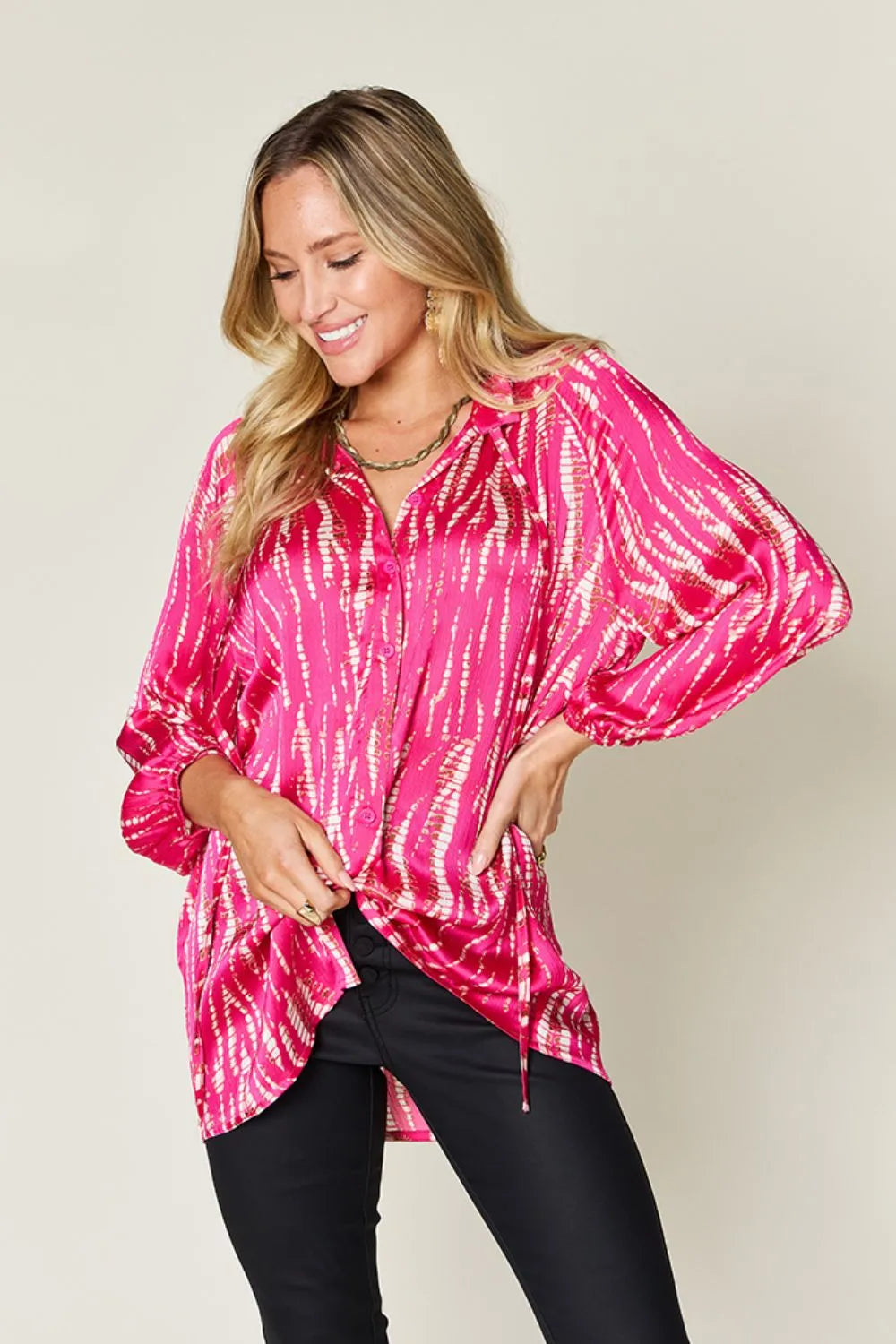Hot pink Trendsi Double Take full size printed button-up long sleeve shirt, featuring bold floral pattern and classic collar.
