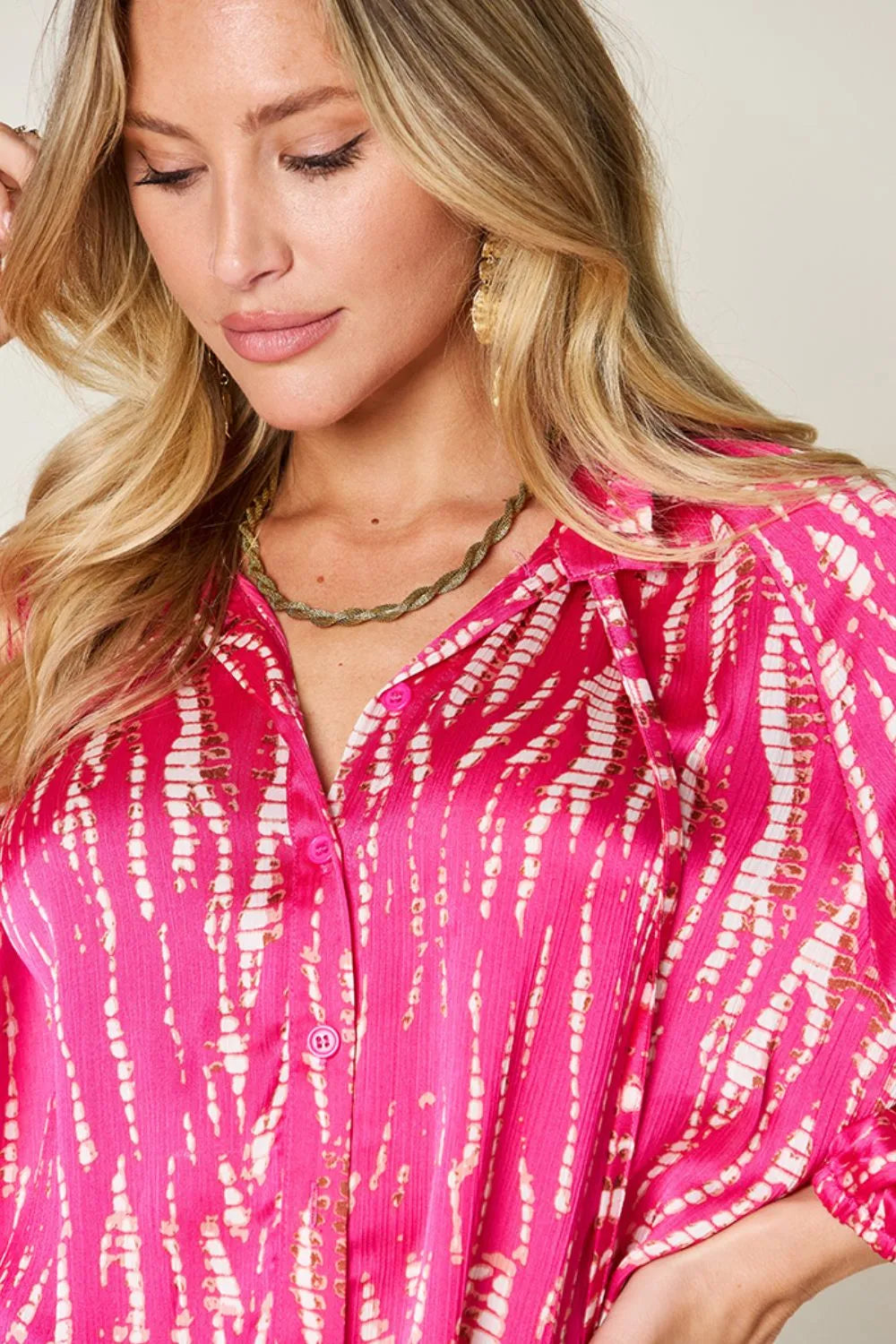 Hot pink Trendsi Double Take long sleeve button-up shirt with full-size printed design, casual and stylish for everyday wear.