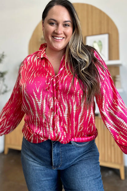 Hot pink Trendsi Double Take printed long sleeve button-up shirt, full size, with bold pattern and classic collar.