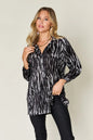 Hot pink double take printed button-up long sleeve shirt by Trendsi, showcasing vibrant design and classic fit.