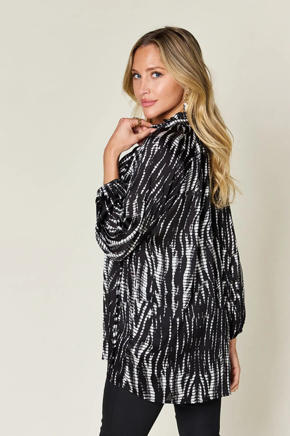 Hot pink Trendsi Double Take full-size printed long sleeve button-up shirt with bold pattern and classic collar.