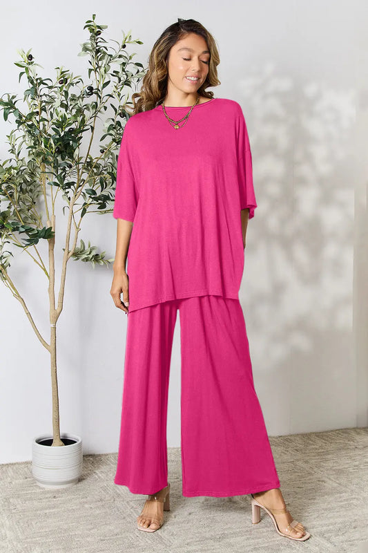 Hot pink double take full size round neck slit top and matching pants set by Trendsi, stylish and comfortable for casual wear.