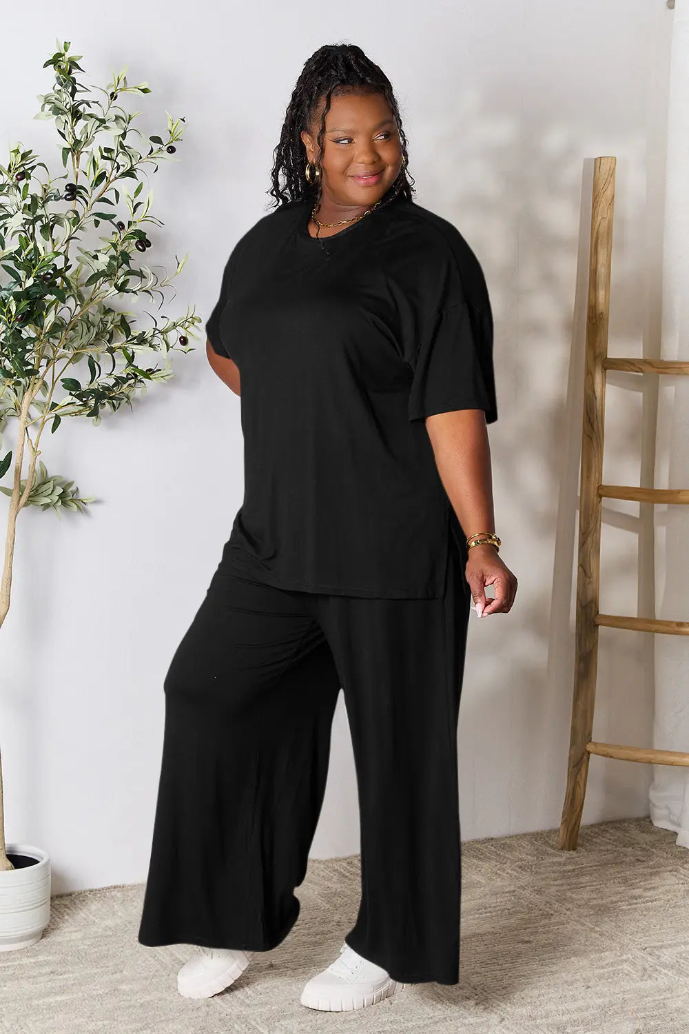 Hot pink Trendsi double take full-size round neck slit top and matching pants set, stylish and comfortable for casual wear.