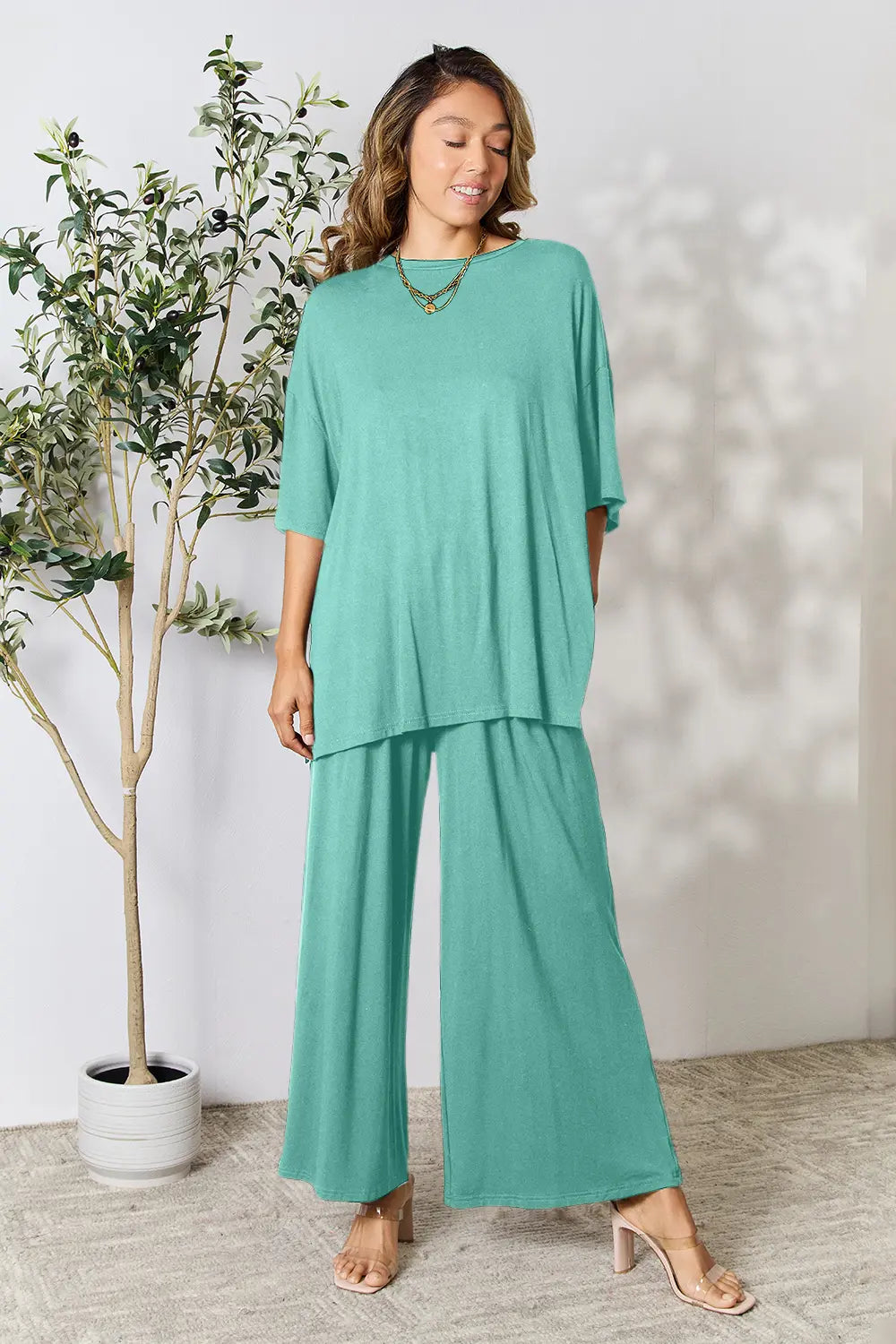 Trendsi hot pink double take full-size round neck slit top and matching pants set, casual stylish outfit.